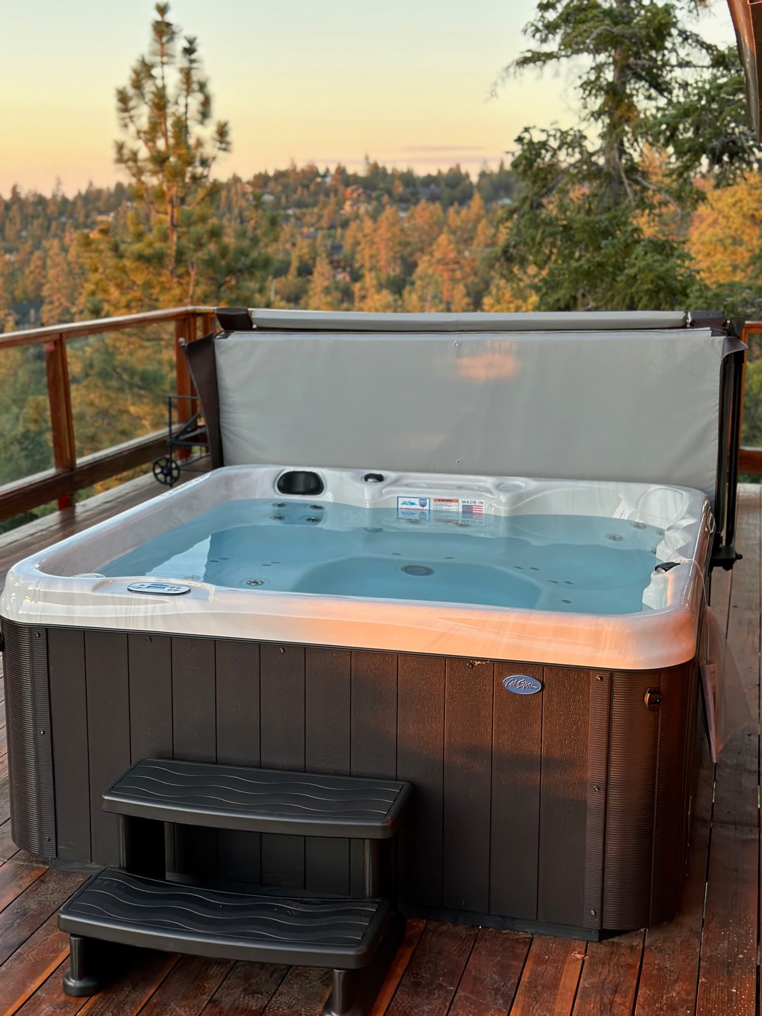 An installed Pinnacle spa at golden hour on a Big Bear deck